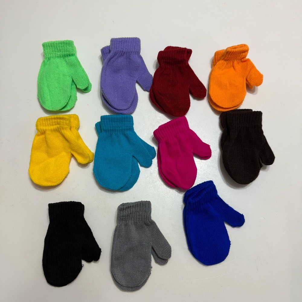 New 11 pairs of toddler
Winter mittens multi color took one pair out to small